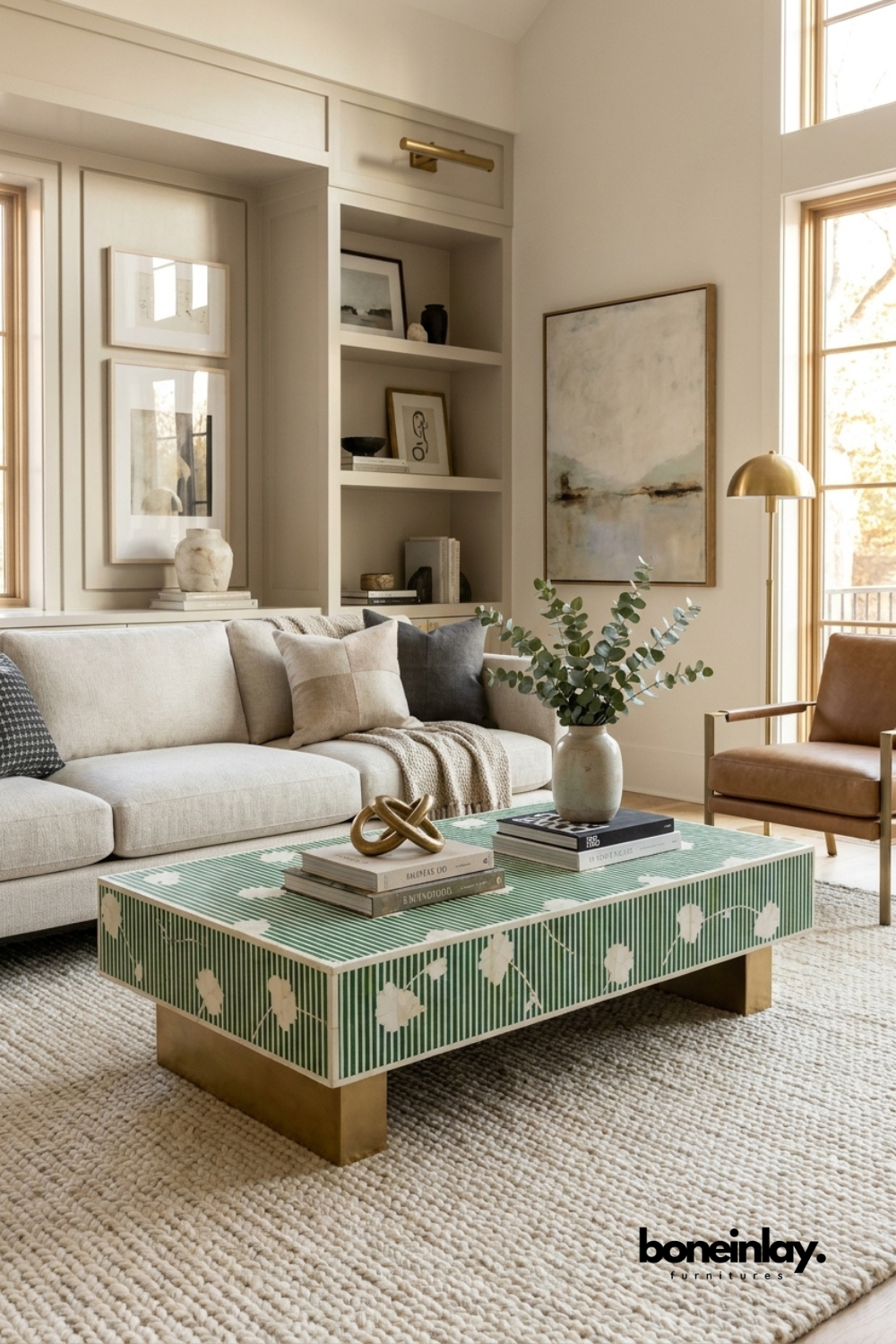 Emerald green floral stripe bone inlay coffee table with gold block legs styled in a warm beige living room — handcrafted luxury furniture.