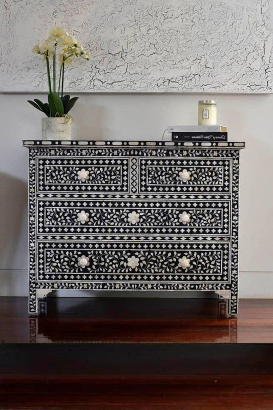 Handmade bone inlay 4-drawer dresser featuring a black floral vine pattern with carved bone inlay knobs and brass hardware