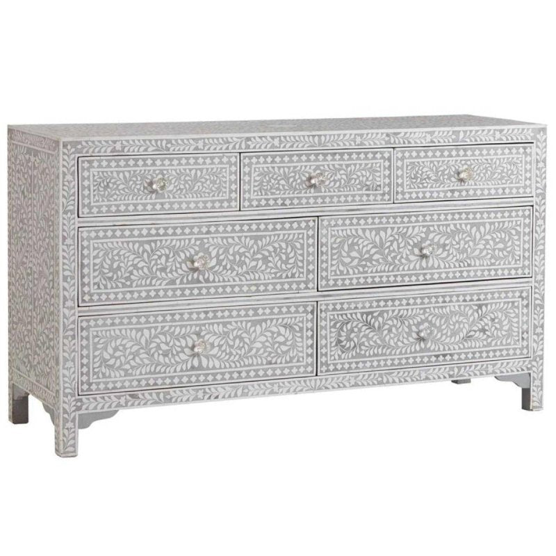 Grey bone inlay 7-drawer dresser angled view – handcrafted floral inlay pattern with crystal drawer knobs on white background
