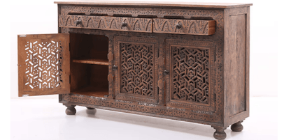 Floral carved wood server in rustic wood, open drawer view with the left cabinet door swung out to reveal a shelf.