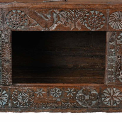 Floral carved hope chest in natural solid wood, front view close-up of the open compartment and patterned frame.