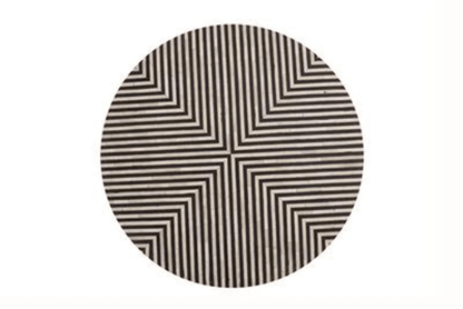Overhead flat lay of a geometric black and white stripe bone inlay round table top showing symmetrical radial stripe pattern crafted by Indian artisans using traditional bone inlay technique