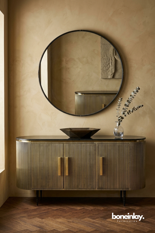 Modern fluted metal sideboard cabinet with rounded corners and brushed brass finish