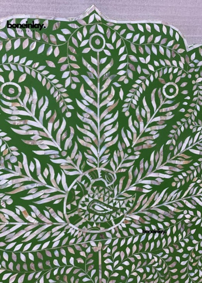 Green Peacock Headboard detail showing iridescent mother of pearl leaf inlay and central peacock motif with handcrafted precision