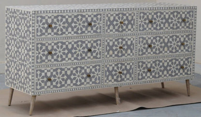 Grey bone inlay nine-drawer dresser with a geometric front pattern, shown as a complete cabinet for bedroom storage.