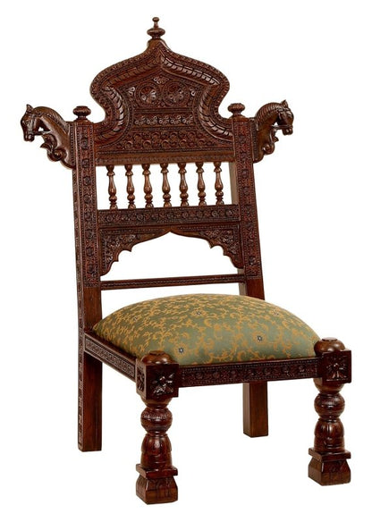 Ornate hand-carved solid wood throne chair with horse head details, intricate floral carvings, and a green patterned upholstered seat.