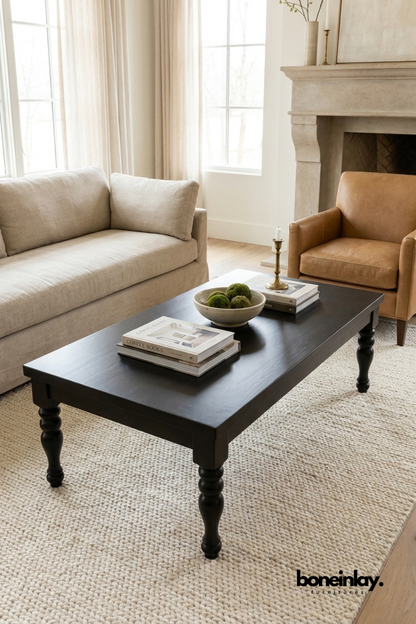 Dark wood coffee table with classic turned legs, simple minimalist wooden furniture for a cozy and traditional UK living room.