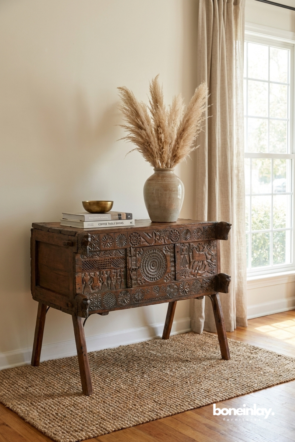 Antique-inspired tribal chest featuring hand-etched patterns, rich aged wood, and rustic character.