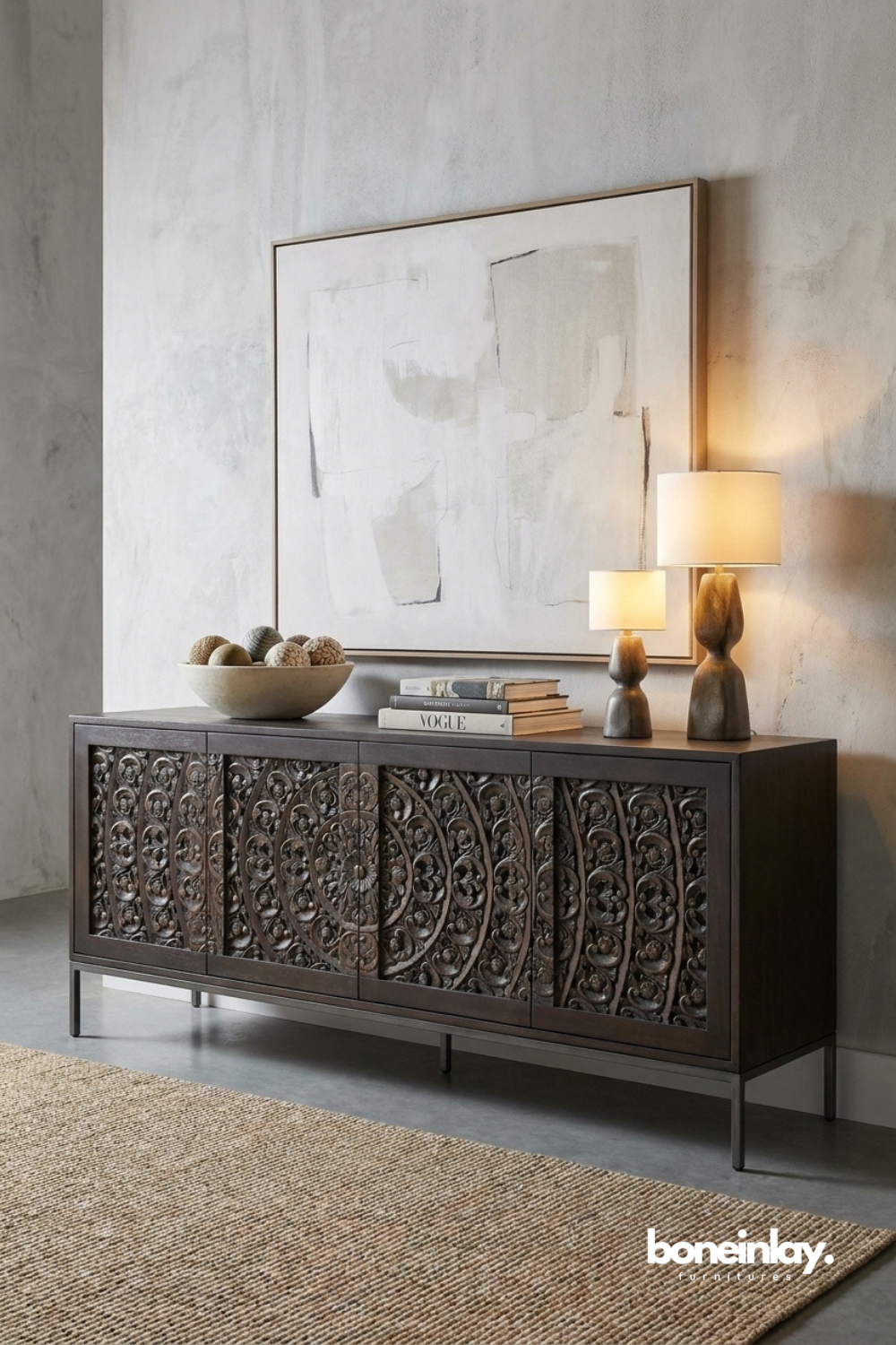 Modern dark wood sideboard showcasing ornate carved panels, sleek metal legs, and contemporary luxury.