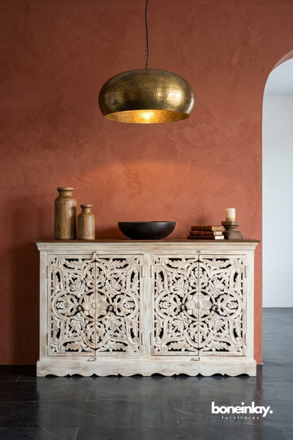 Hand carved floral wood sideboard cabinet in distressed white finish with intricate scrollwork panel doors
