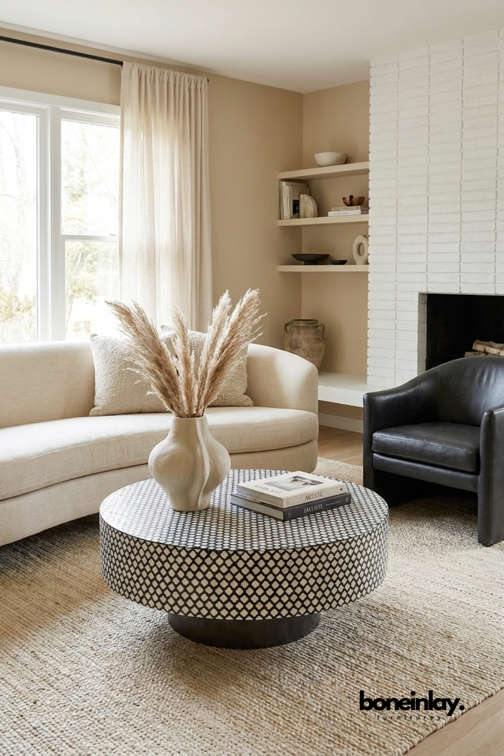 Round black and white bone inlay coffee table with a repeating clover pattern and black plinth base by Boneinlay Furnitures