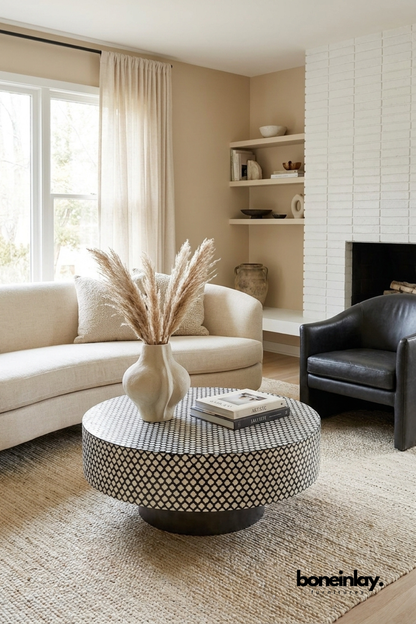 Round black and white bone inlay coffee table with a repeating clover pattern and black plinth base by Boneinlay Furnitures