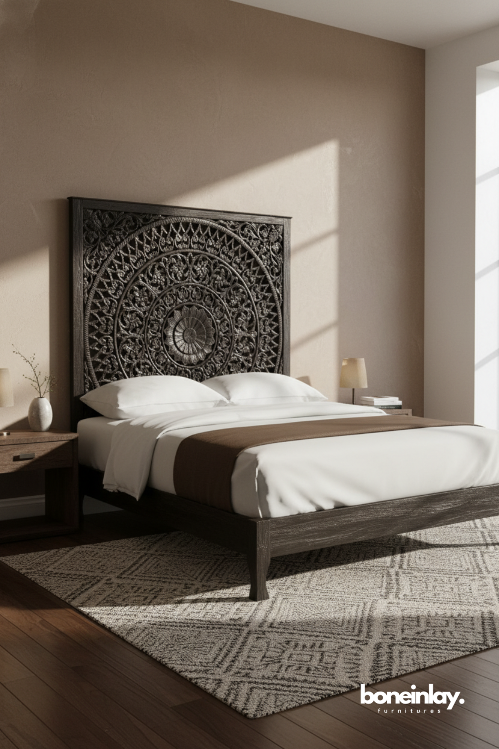 Black carved wood bed featuring circular mandala headboard and handcrafted detailing.