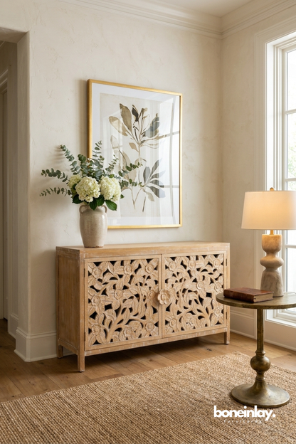 Hand carved floral wooden sideboard featuring intricate botanical lattice doors and natural finish.
