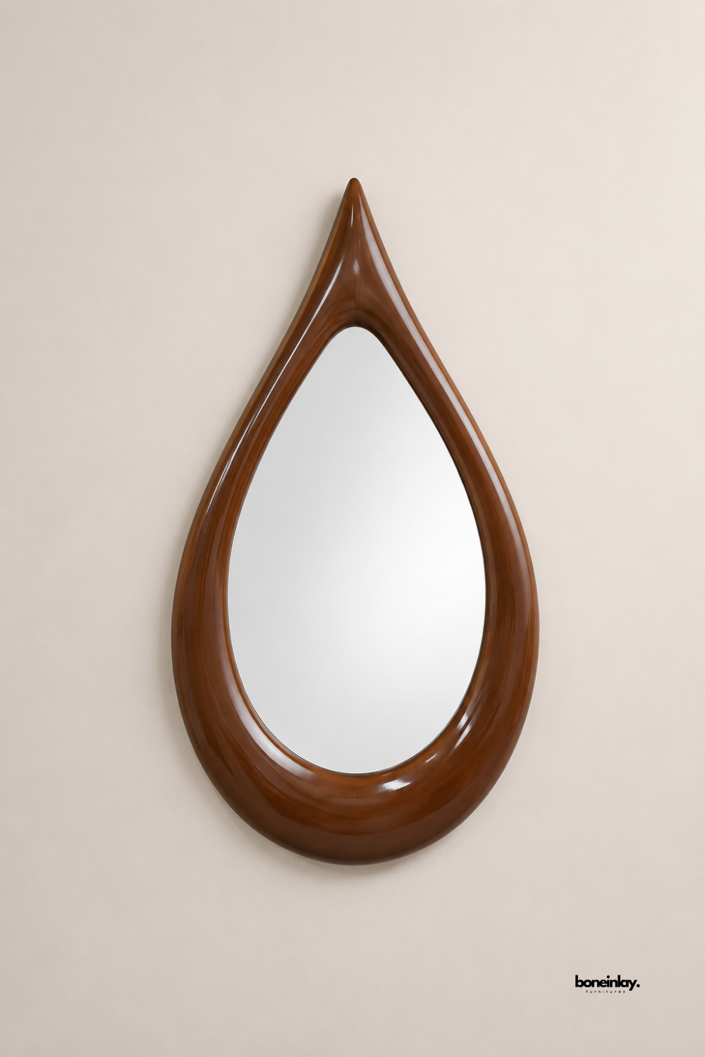Artisan-crafted teardrop wooden frame mirror showcasing smooth contoured curves and a polished warm walnut finish against a clean backdrop. This unique organic wall accent functions as a striking focal point, perfect for modern entryway, living room, or bedroom vanity spaces.
