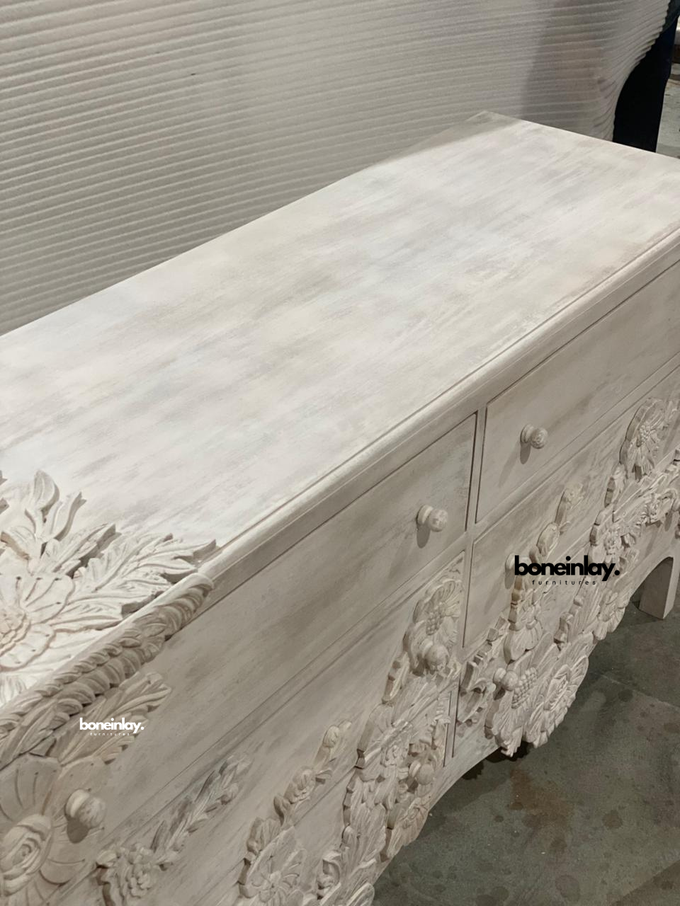 Carved detail of flower dresser