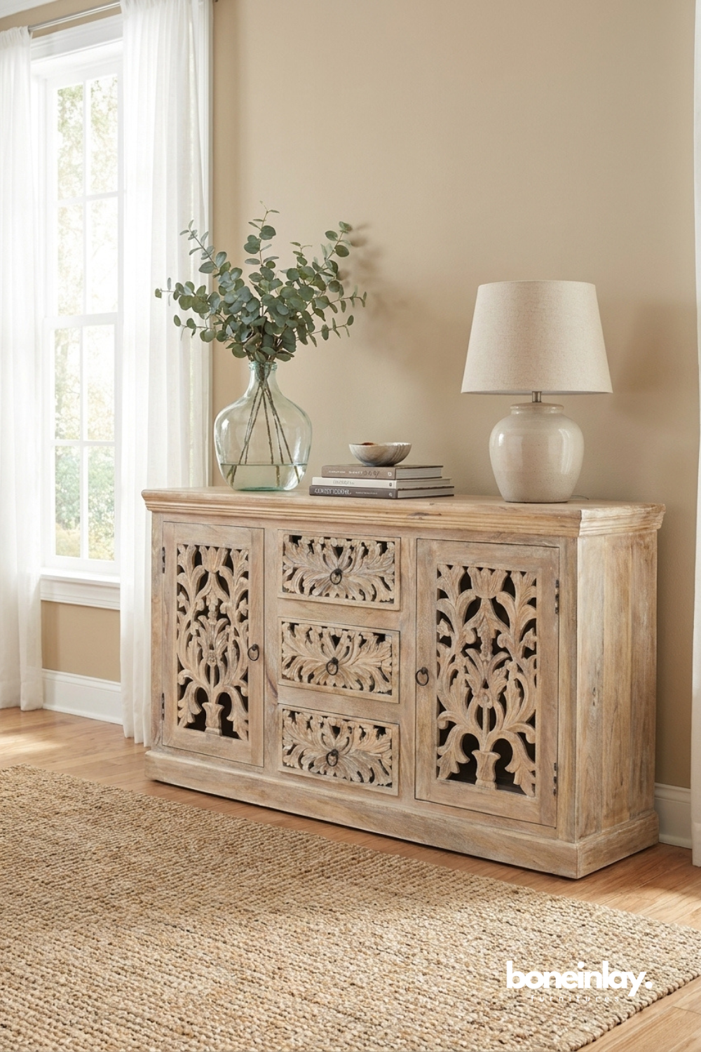 Natural wood storage buffet featuring openwork botanical carvings and warm rustic elegance.