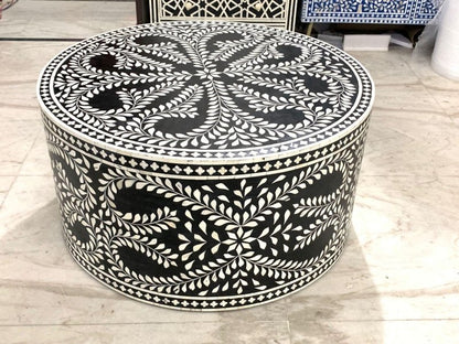 Handcrafted black and white floral bone inlay round centre table with radiating leaf motif on tabletop and continuous floral vine pattern wrapping the full drum body.