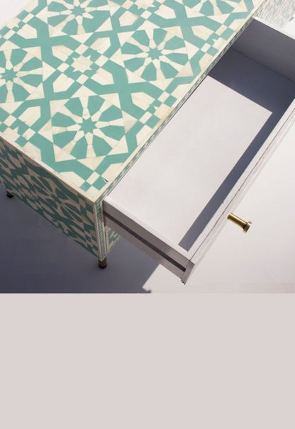 Sage green bone inlay six-drawer nursery dresser with Moroccan-inspired geometric pattern and gold-finished tapered legs