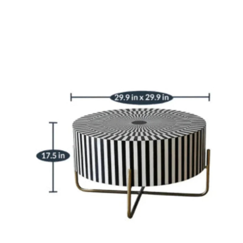 Round handcrafted bone inlay coffee table with sunburst striped pattern in black and white on a brass metal frame