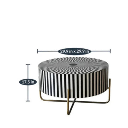 Round handcrafted bone inlay coffee table with sunburst striped pattern in black and white on a brass metal frame
