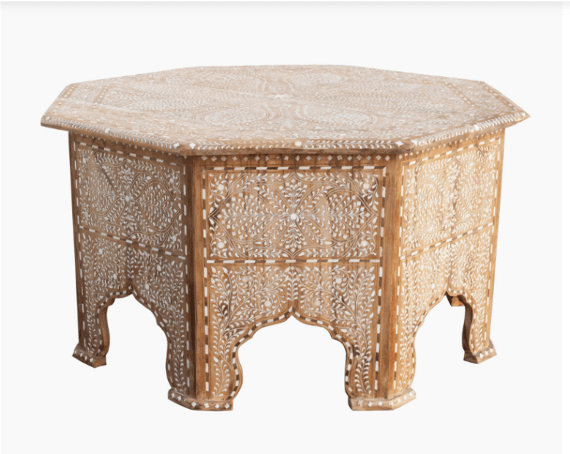 Full front view of handmade octagonal bone inlay coffee table with Moorish arch base and all-over floral inlay pattern on white background.