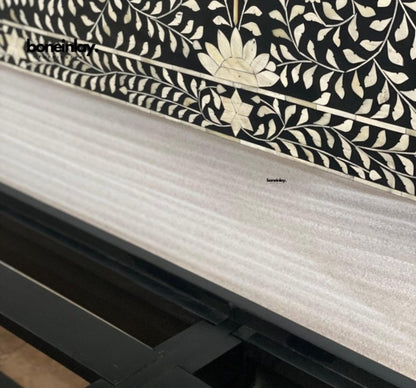 Angled detail of Black Bone Inlay Bed featuring floral motif on headboard, floral vine inlay pattern, and sturdy wooden platform frame – Handmade Indian Bedroom Furniture