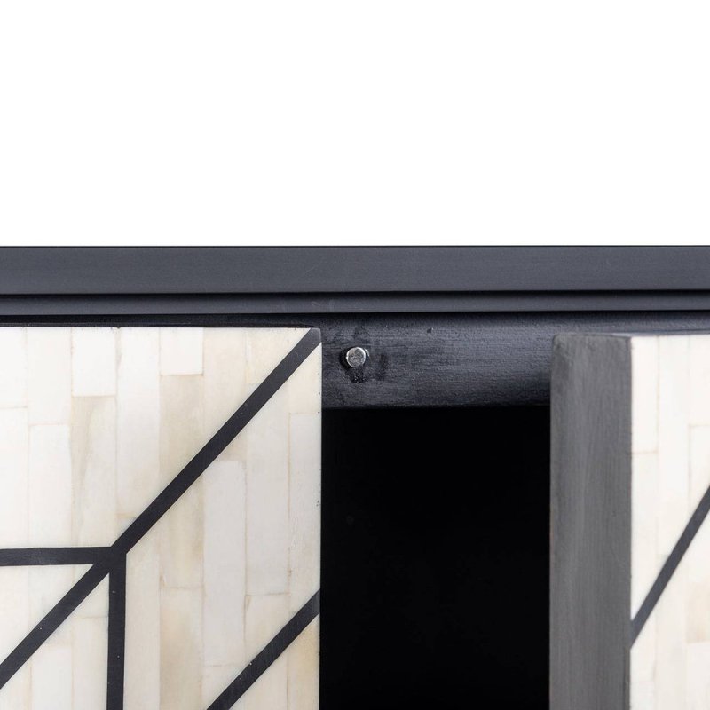 Interior construction detail of bone inlay sideboard showing open door hinge, handmade white inlay panel with black geometric linework and wooden frame