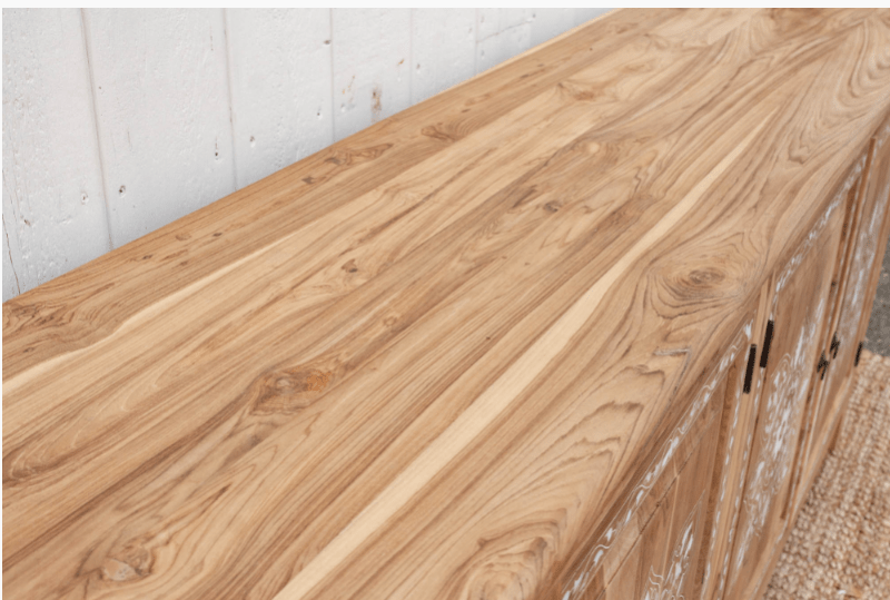 Close-up of natural teak wood grain surface on handmade teak wood inlay sideboard showing rich bleached wood texture