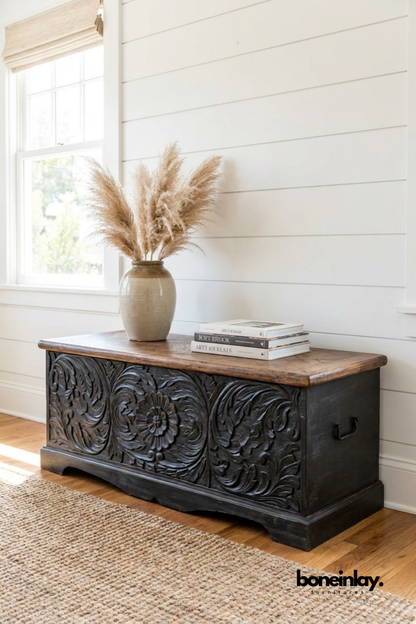 Hand-Carved Wooden Storage Chest with Floral Details and Neutral Decor