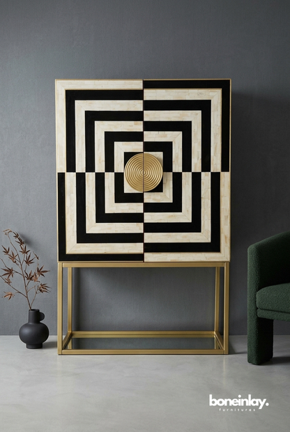 Handmade bone inlay Art Deco bar cabinet in black and white concentric square optical illusion pattern with brass circular knob and gold metal base, styled interior setting