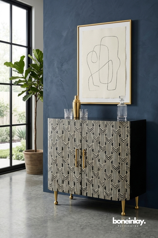 Black and white bone inlay curio cabinet featuring a striking patchwork of mixed geometric patterns across drawers and open shelving. Combines closed storage with display niches for books, sculptures, and decorative objects. Slim black metal legs complete the bold graphic silhouette. A dramatic statement cabinet for eclectic and maximalist living spaces.