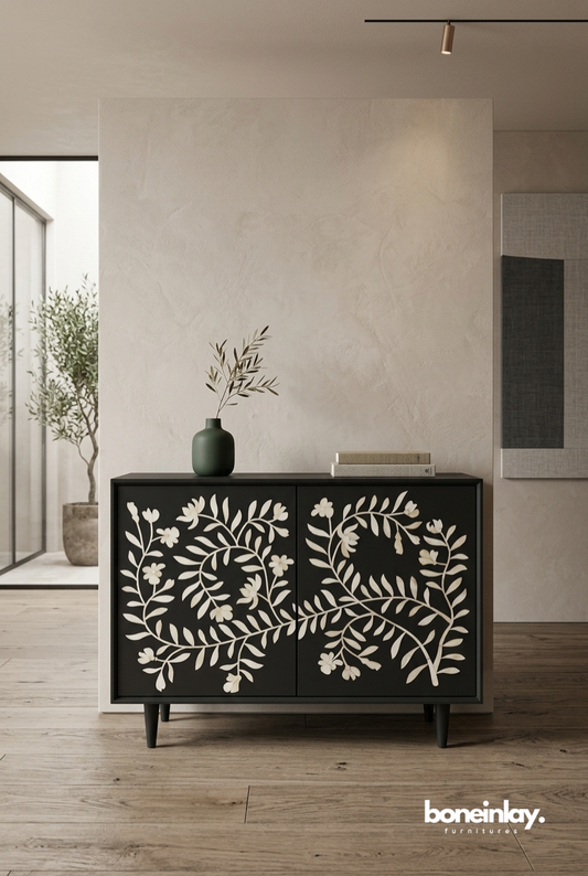 Handmade charcoal grey bone inlay two-door floral cabinet with ivory vine pattern and mid-century tapered legs on grey background