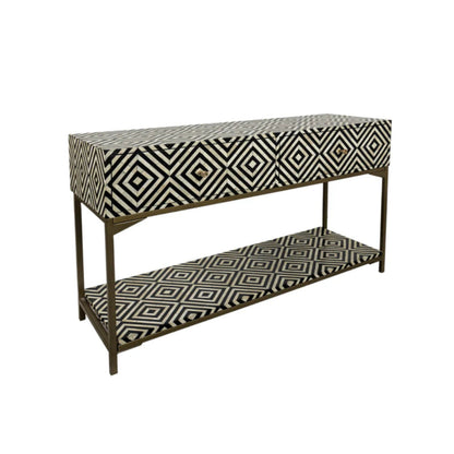 Handmade bone inlay console table featuring bold diamond geometric pattern on drawer fronts and lower shelf, set on a dark metal frame, white background