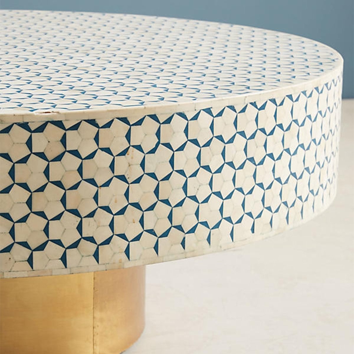 Close-up view of the blue and white bone inlay occasional table, showing the handcrafted geometric inlay pattern across the circular tabletop with detailed blue and white surface work and the product’s Moroccan furniture character.