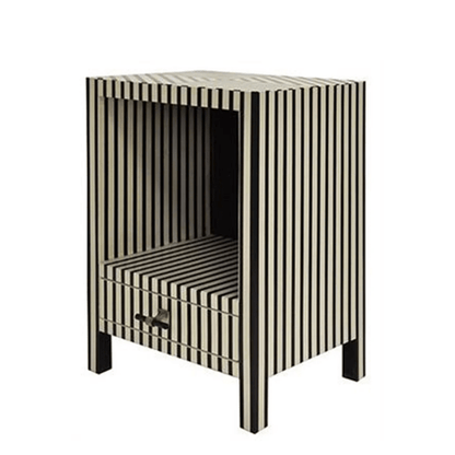 Angled view of a handmade bone inlay nightstand with bold vertical black and white stripes, open shelf compartment, and one bottom storage drawer