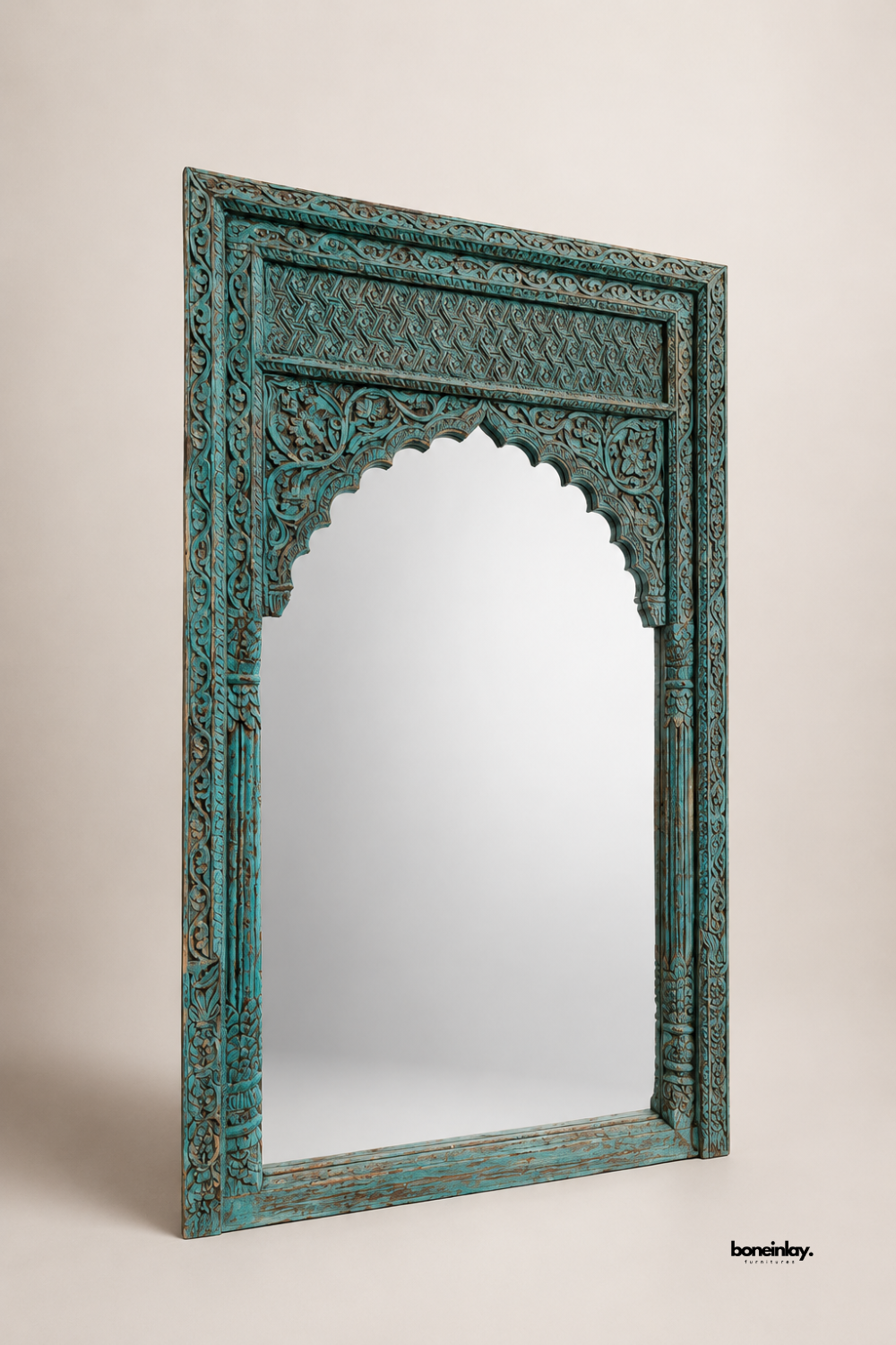 Artisan-crafted turquoise distressed wooden frame mirror showcasing intricate Jharokha arch details and hand-carved floral border scrollwork. Presented in a clean studio setting, this large full-length wall or floor mirror combines authentic rustic craftsmanship with timeless bohemian wall decor.