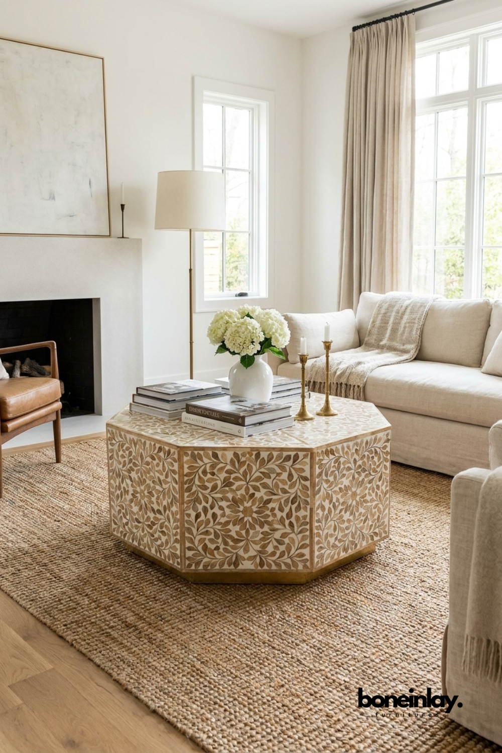 Large octagonal bone inlay coffee table featuring a delicate beige and white floral leaf pattern in a cozy living room by Boneinlay Furnitures
