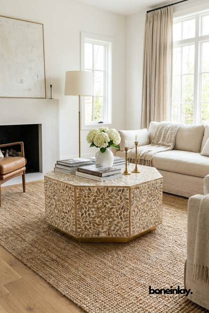 Large octagonal bone inlay coffee table featuring a delicate beige and white floral leaf pattern in a cozy living room by Boneinlay Furnitures