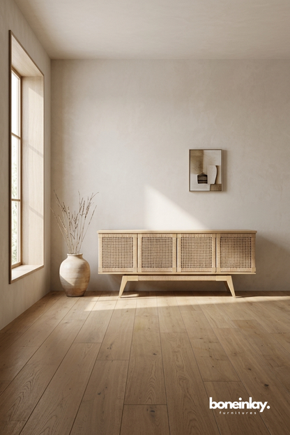 Minimalist natural rattan sideboard featuring woven cane panels and clean Scandinavian-inspired design.