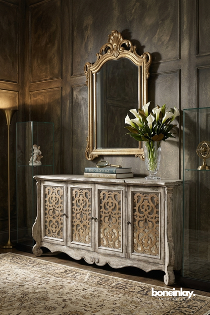 Distressed carved wood buffet cabinet with decorative fretwork doors and antique washed finish