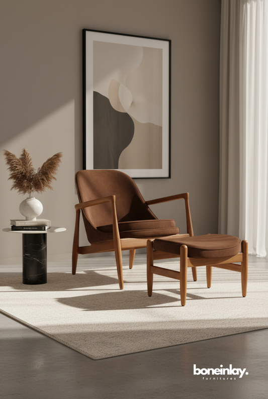Ib Kofod Larsen-inspired wooden lounge armchair with matching ottoman and upholstered seat.