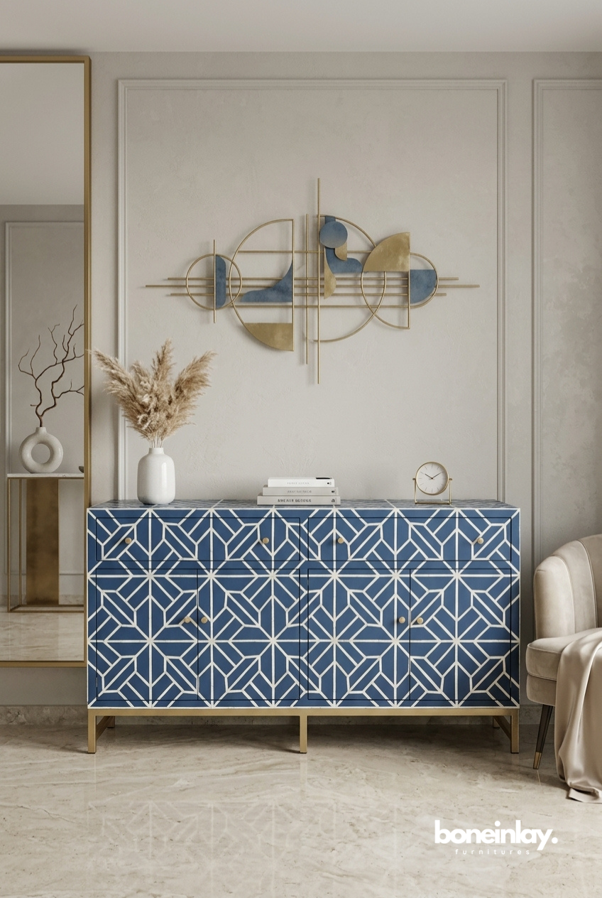 Indigo blue Iberia geometric bone inlay 4-door sideboard with gold metal legs styled in a modern luxury living room with wall art and decor accents
