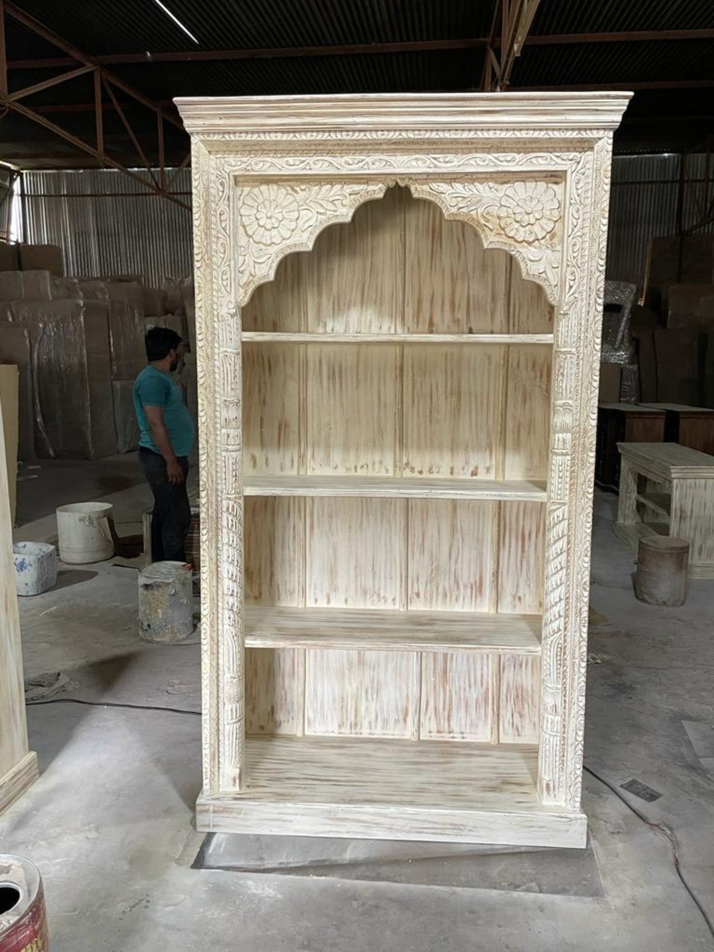 Hand-carved solid wood Indian arch bookcase with 4-tier shelving in distressed antique white wash finish