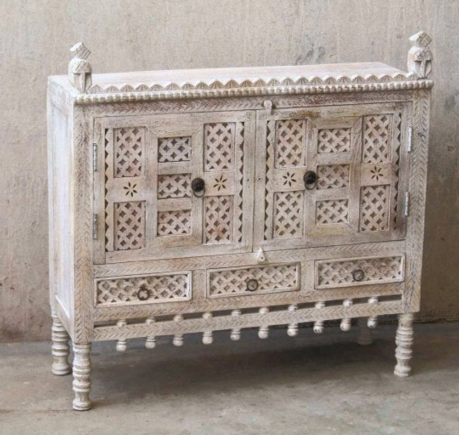 Hand-carved solid wood Indian 2-door sideboard cabinet with diamond Jali lattice panels and bobbin apron trim in distressed antique whitewash finish.