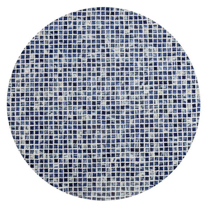 Indigo blue and white bone inlay mosaic grid pattern covering the full round surface of a handcrafted luxury coffee table, artisan detail view
