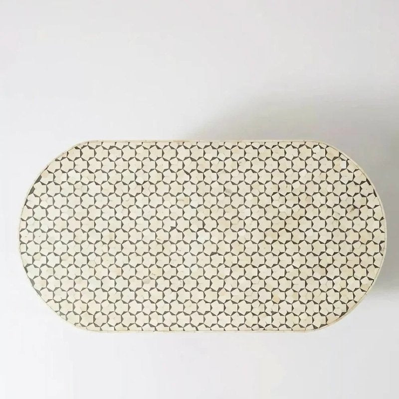 Moroccan white bone inlay oval accent table with charcoal pattern and brass base, top view showing the complete surface