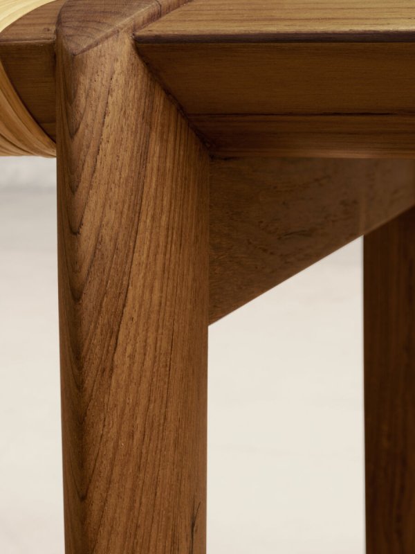 Natural teak bench with woven rattan cane surface, ideal as a living room seat or decorative side table.