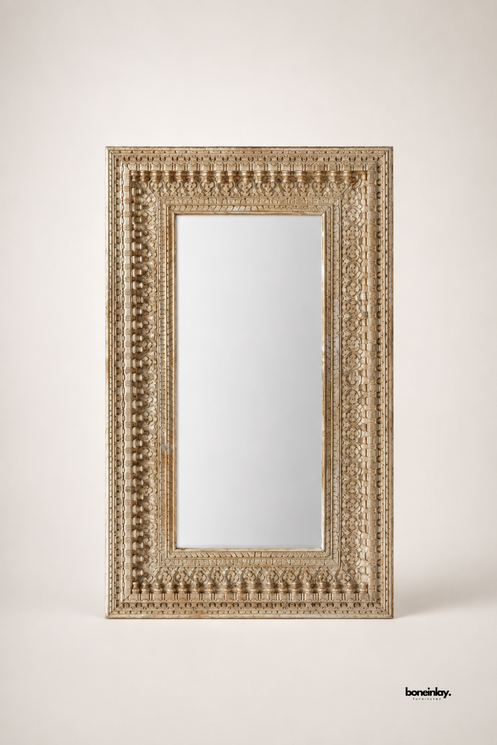 Artisan-crafted whitewashed solid wood rectangular mirror showcasing intricate hand-carved floral patterns and turned wooden peg detailing along the outer frame. Displayed against a clean studio background, this large decorative accent mirror delivers rustic charm, architectural depth, and premium quality for modern living spaces.