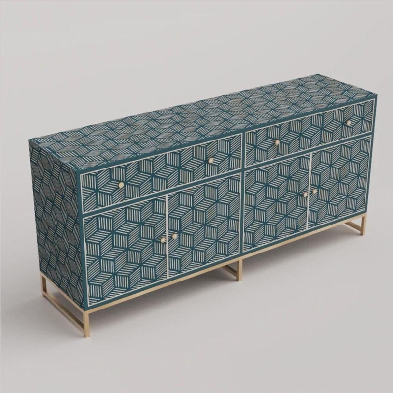 Three-quarter view of large teal blue bone inlay buffet cabinet with intricate geometric cube stripe inlay, two drawers, four doors, full top surface detail visible, and brushed brass metal base.